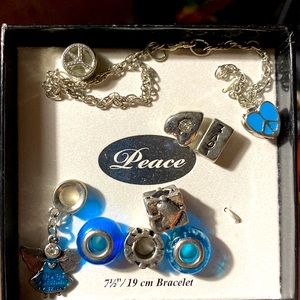 Blue charm bracelet with 8 charms